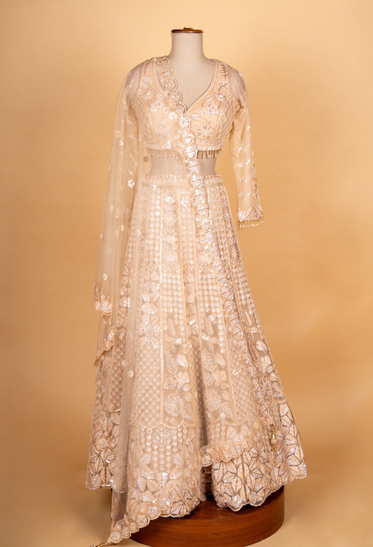 Champagne gold embroidered bridal lehenga choli with sheer dupatta – product image 2