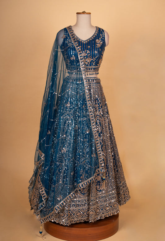 Teal blue heavy embroidered designer lehenga choli with net dupatta – product image 2