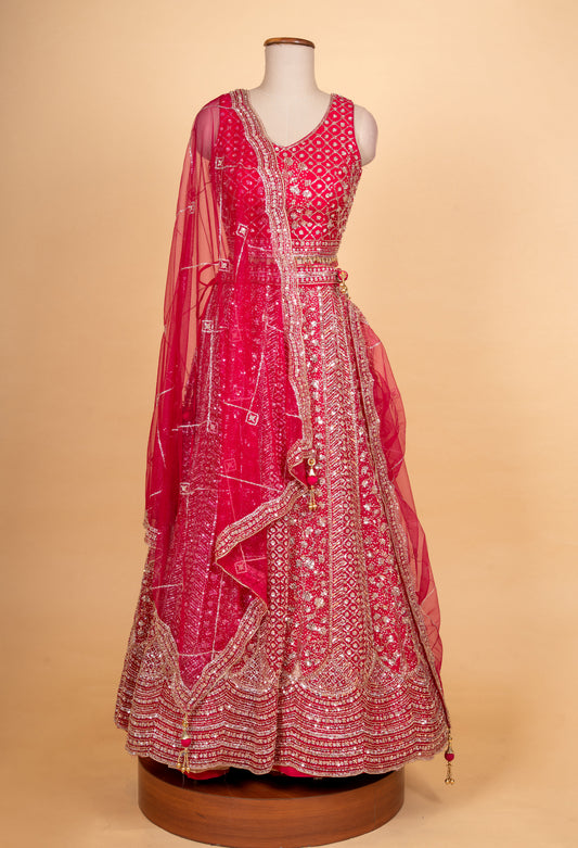 Red heavy embroidered bridal lehenga choli with net dupatta – product image 2