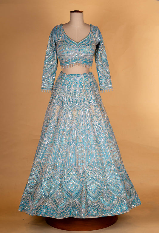 Aqua blue bridal lehenga with silver thread embroidery