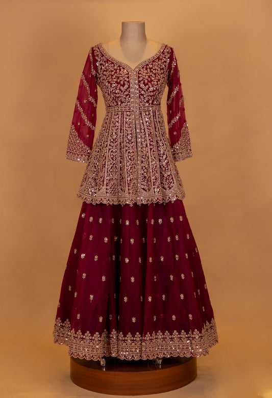 Deep maroon lehenga with gold zari and thread embroidery