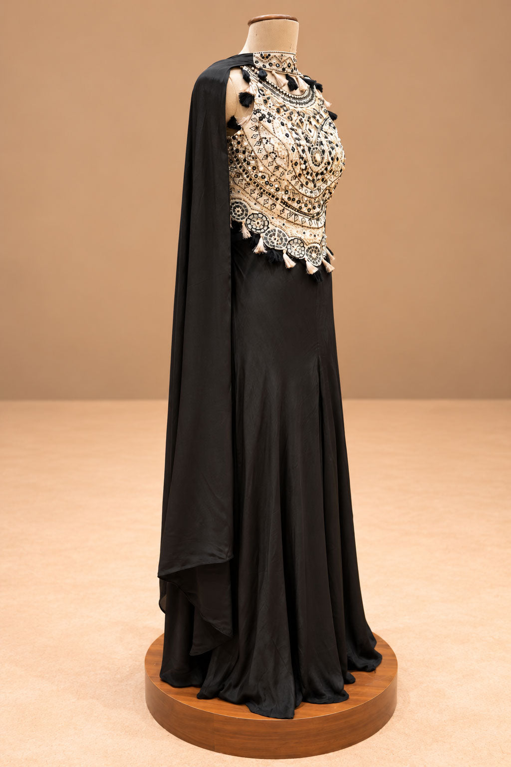 Elegant Black Designer Cape Gown with Gold Embroidered Bodice & Tassel Detailing