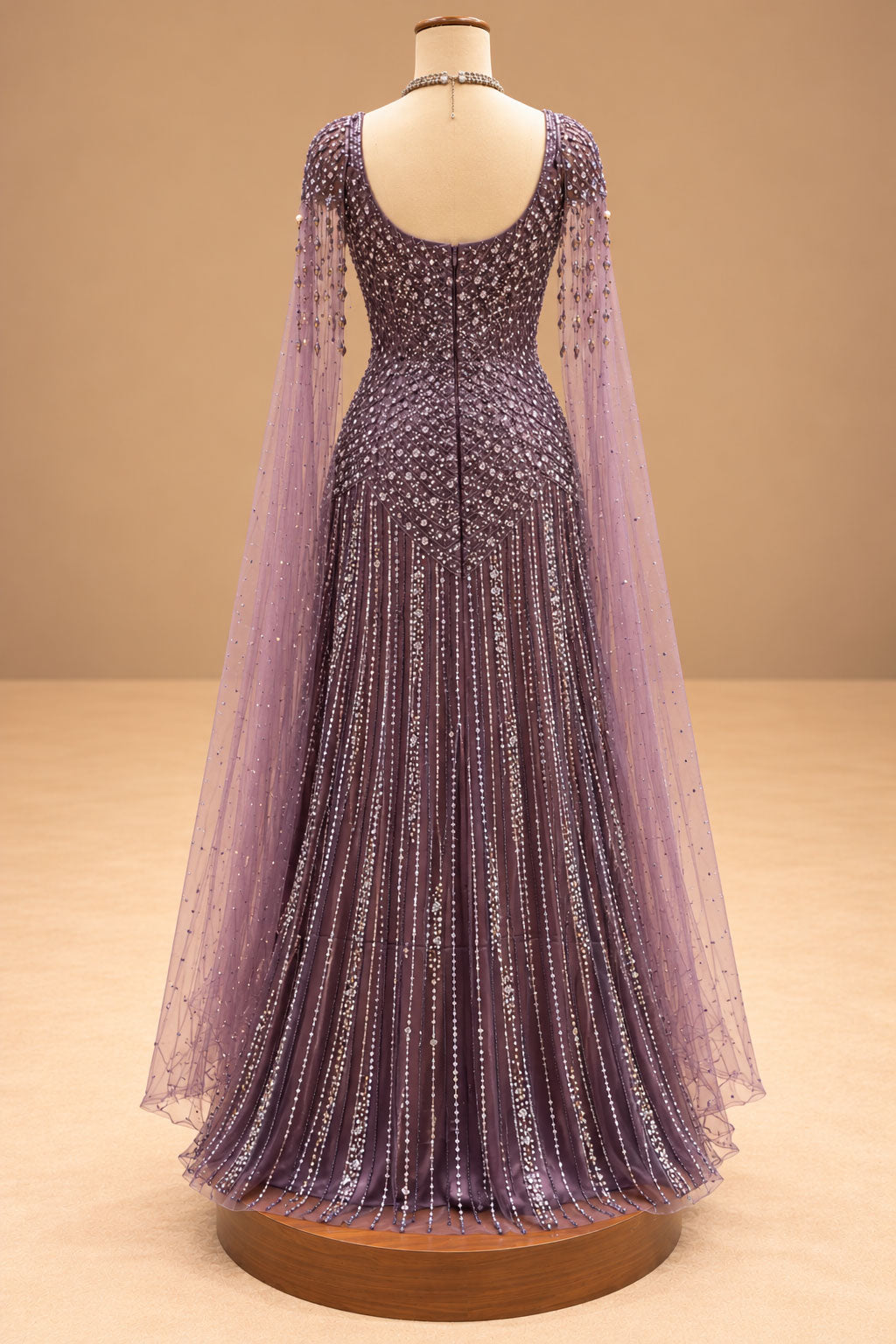 Elegant Dusty Mauve Designer Gown with Sequin Embroidery & Cape Sleeves