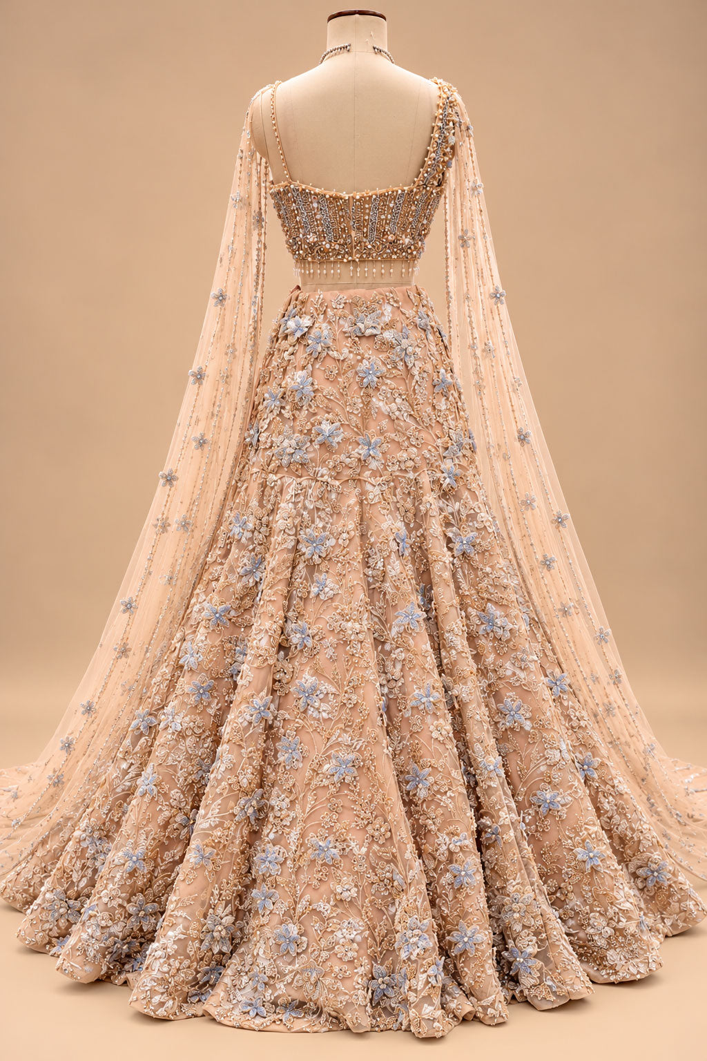 Luxury Peach Bridal Lehenga with 3D Floral Embroidery and Blue Floral Detailing