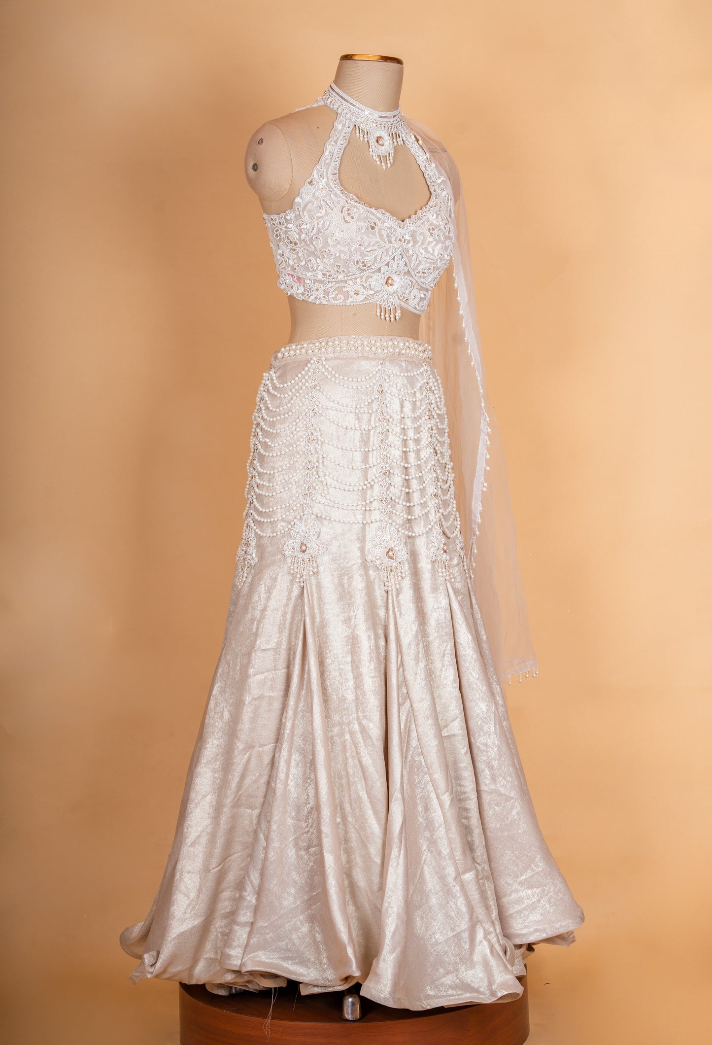 Luxury Champagne Gold Embellished Lehenga Choli with Halter Neck Blouse & Sheer Dupatta