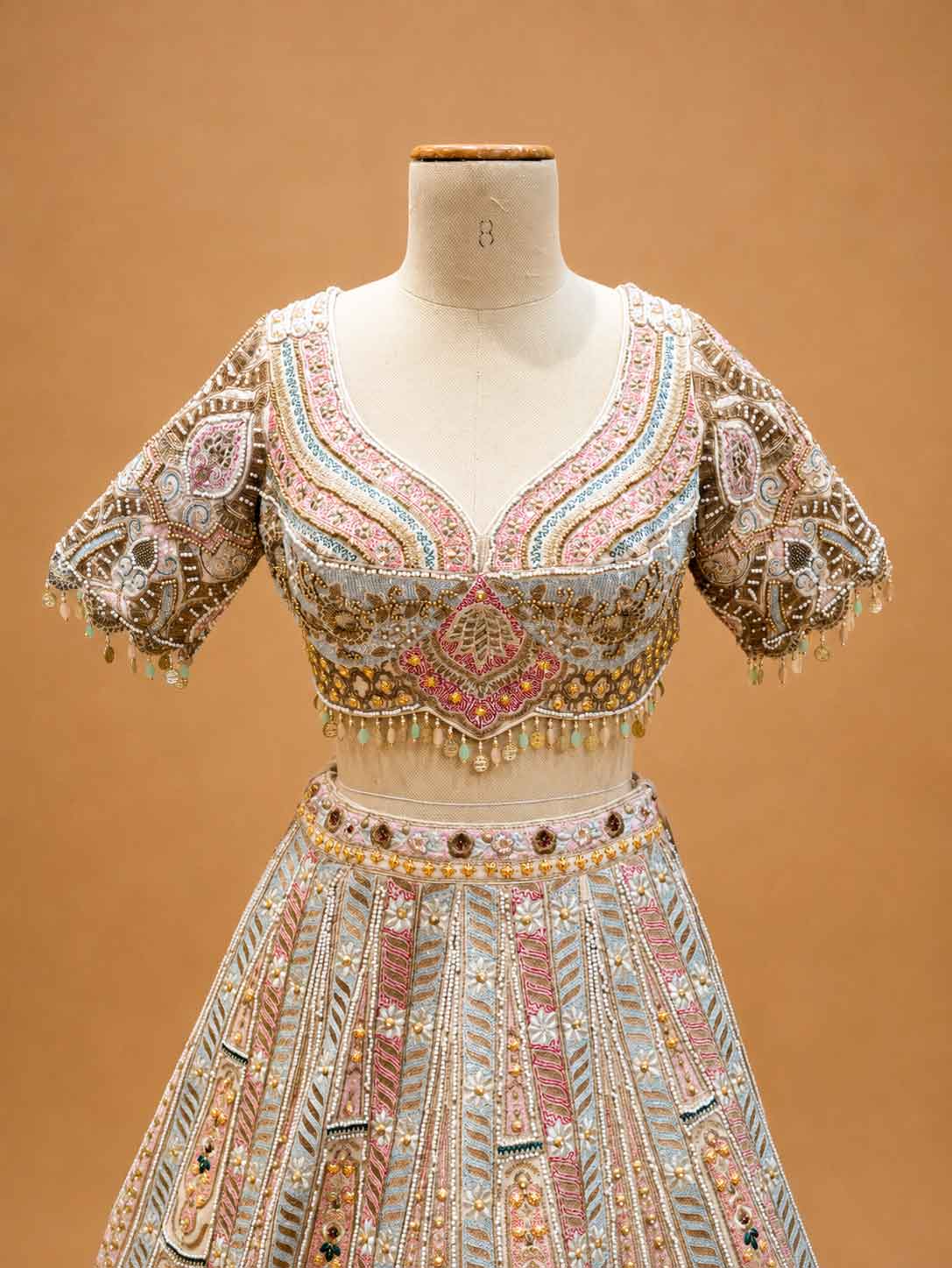 Pastel Multicolor Designer Bridal Lehenga with Intricate Embroidery & Embellished Net Dupatta
