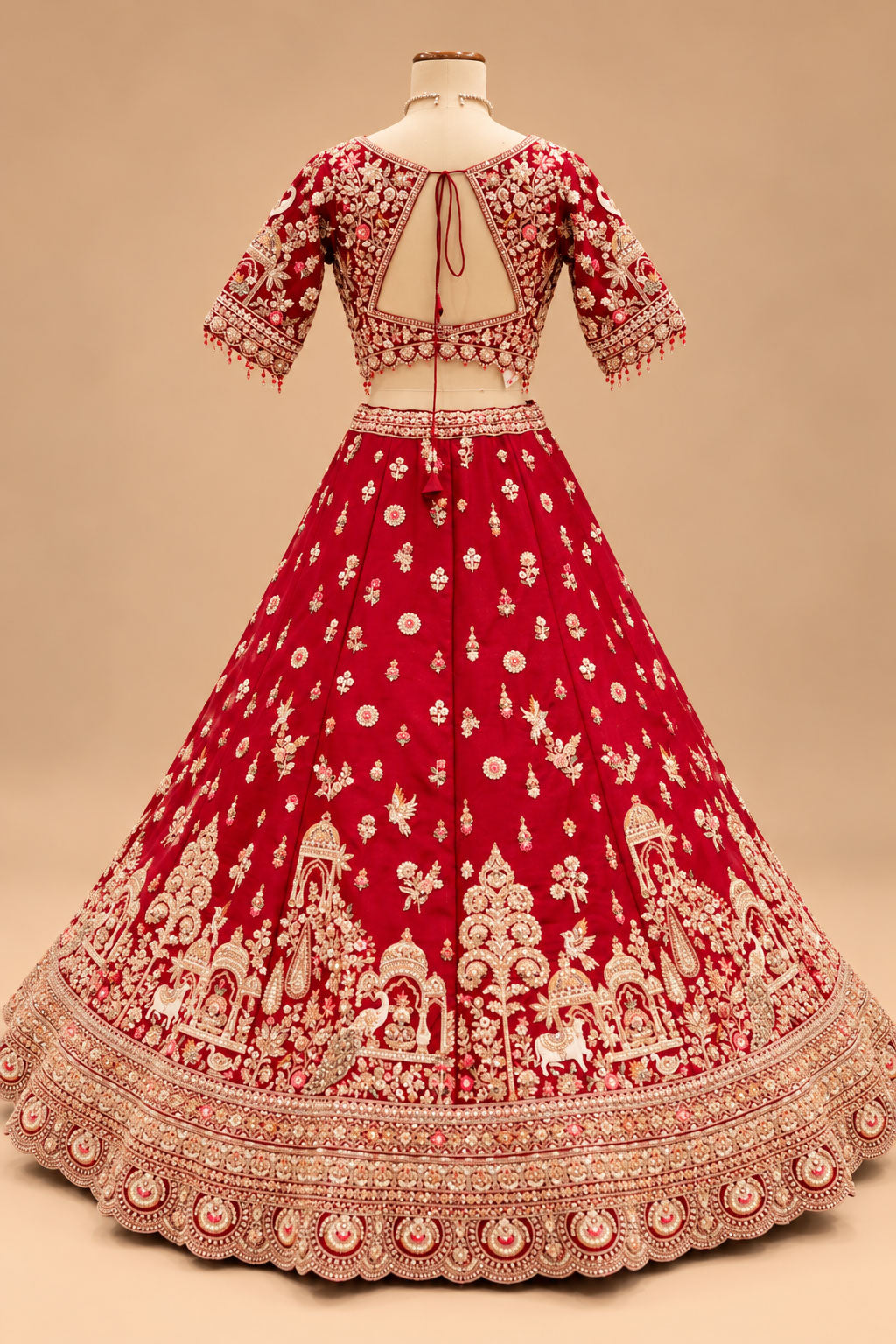 Luxury Red Bridal Lehenga with Intricate Gold Embroidery, Traditional Motifs and Designer Dupatta