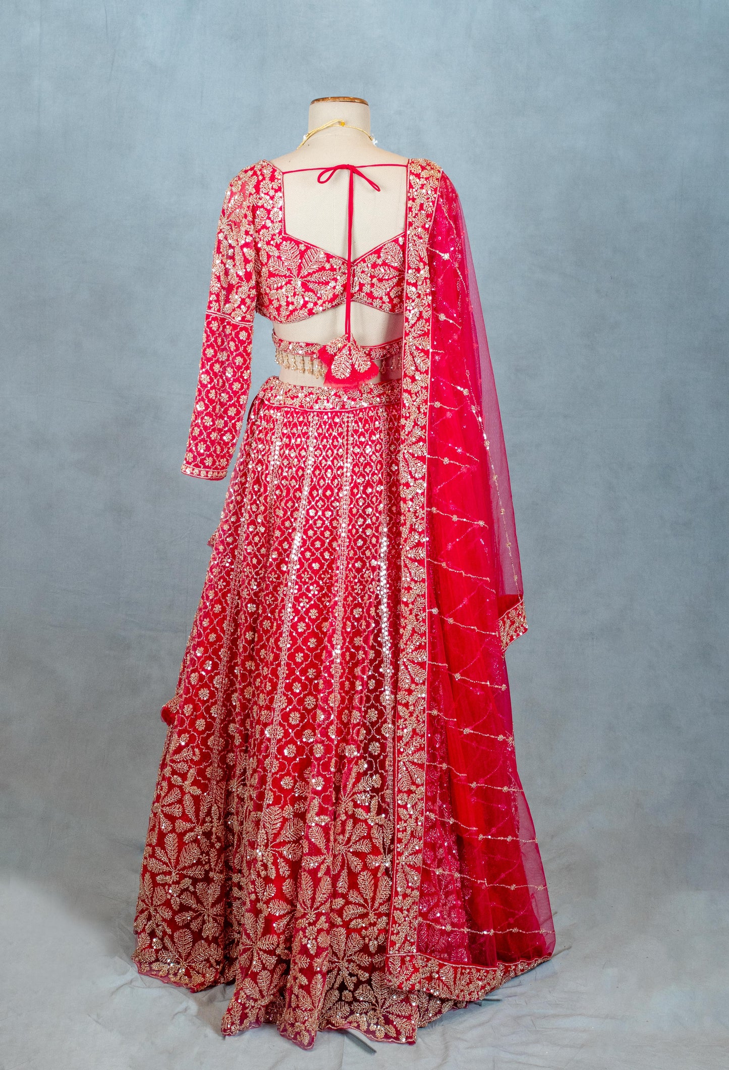 Red Designer Crop Top Lehenga with Heavy Gold Embroidery & Dupatta – Bridal & Festive Ensemble