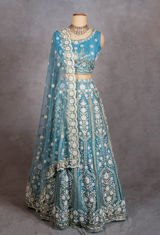 Sky blue sleeveless crop top lehenga with white floral embroidery and net dupatta – alternate view 2