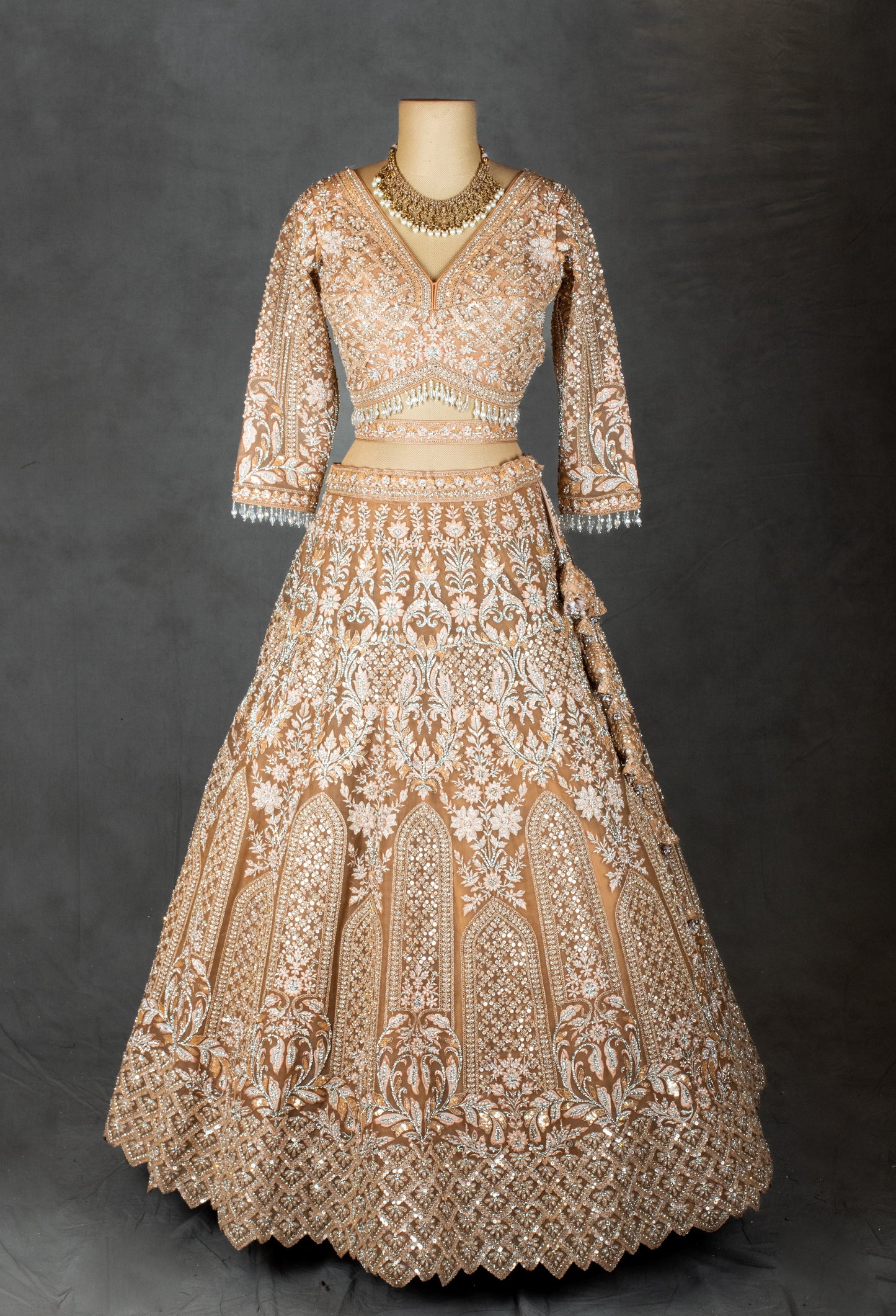 Elegant Beige Embroidered Bridal Lehenga with Net Dupatta & Detailed Work