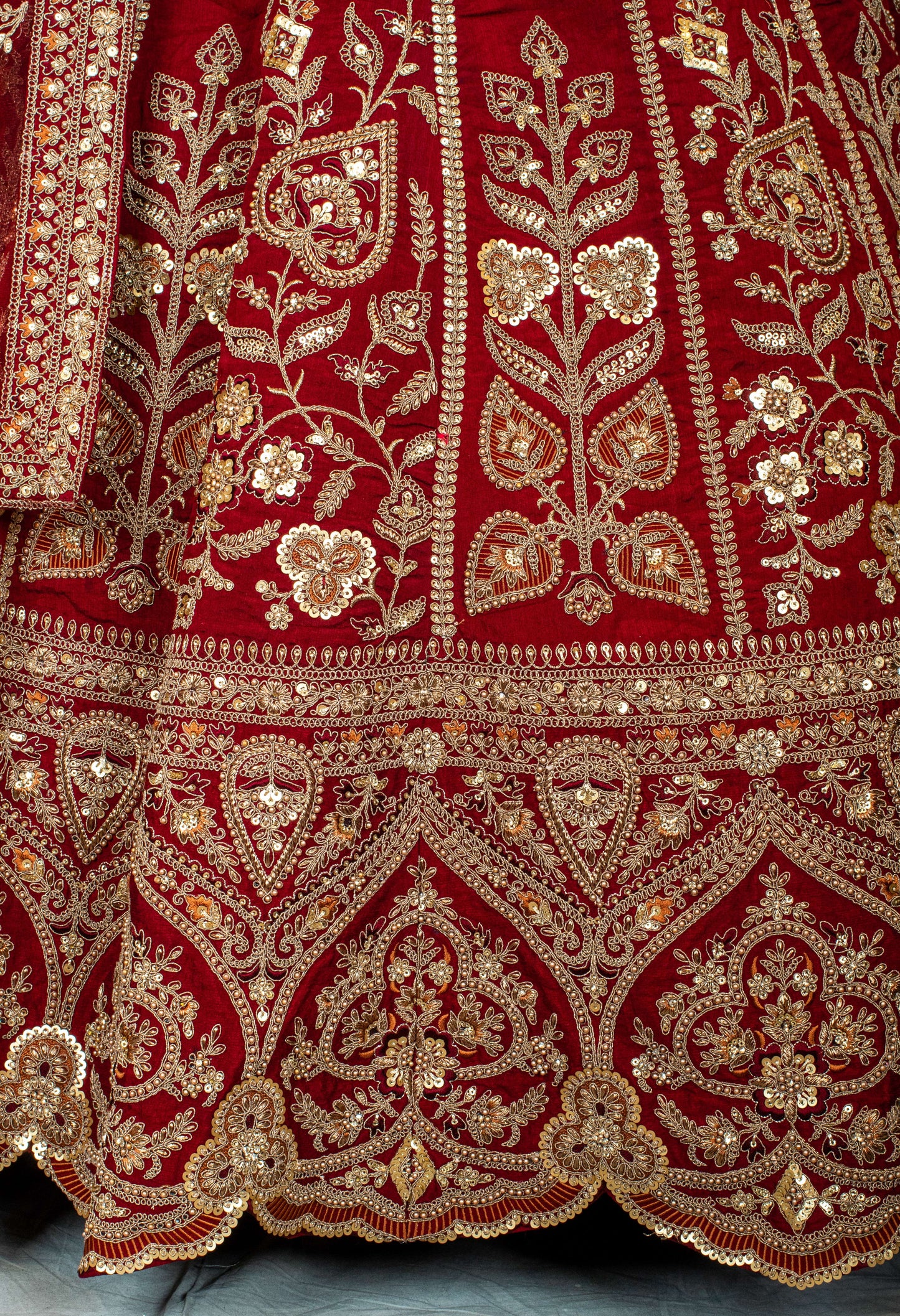 Classic Red Bridal Lehenga with Heavy Golden Embroidery and Net Dupatta