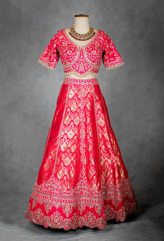 Vibrant pink bridal lehenga with golden zari embroidery – product image 2