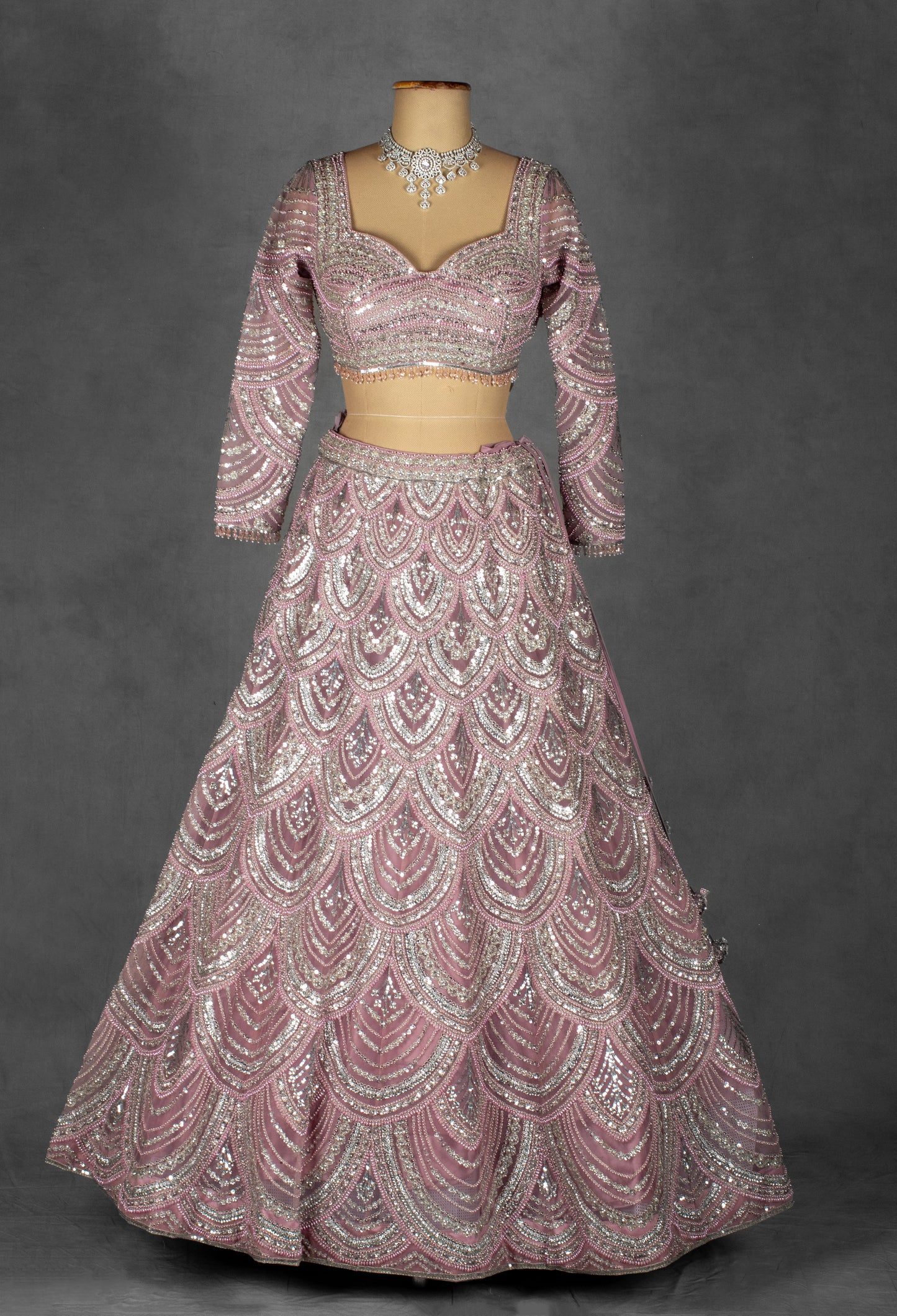 Blush Pink Sequin Embellished Bridal Lehenga Set with Net Dupatta and Full Sleeves
