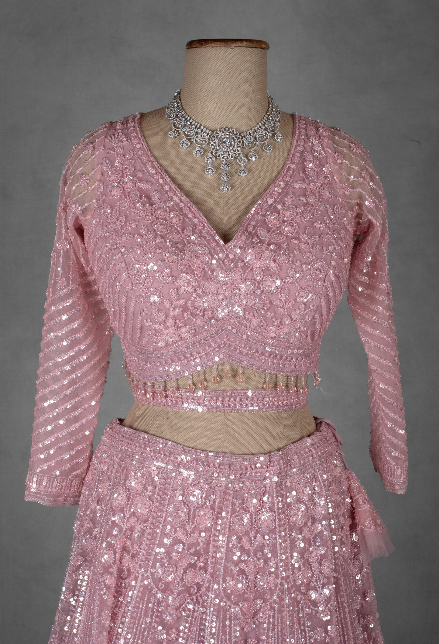 Pastel Pink Embroidered Crop Top Lehenga with Net Dupatta