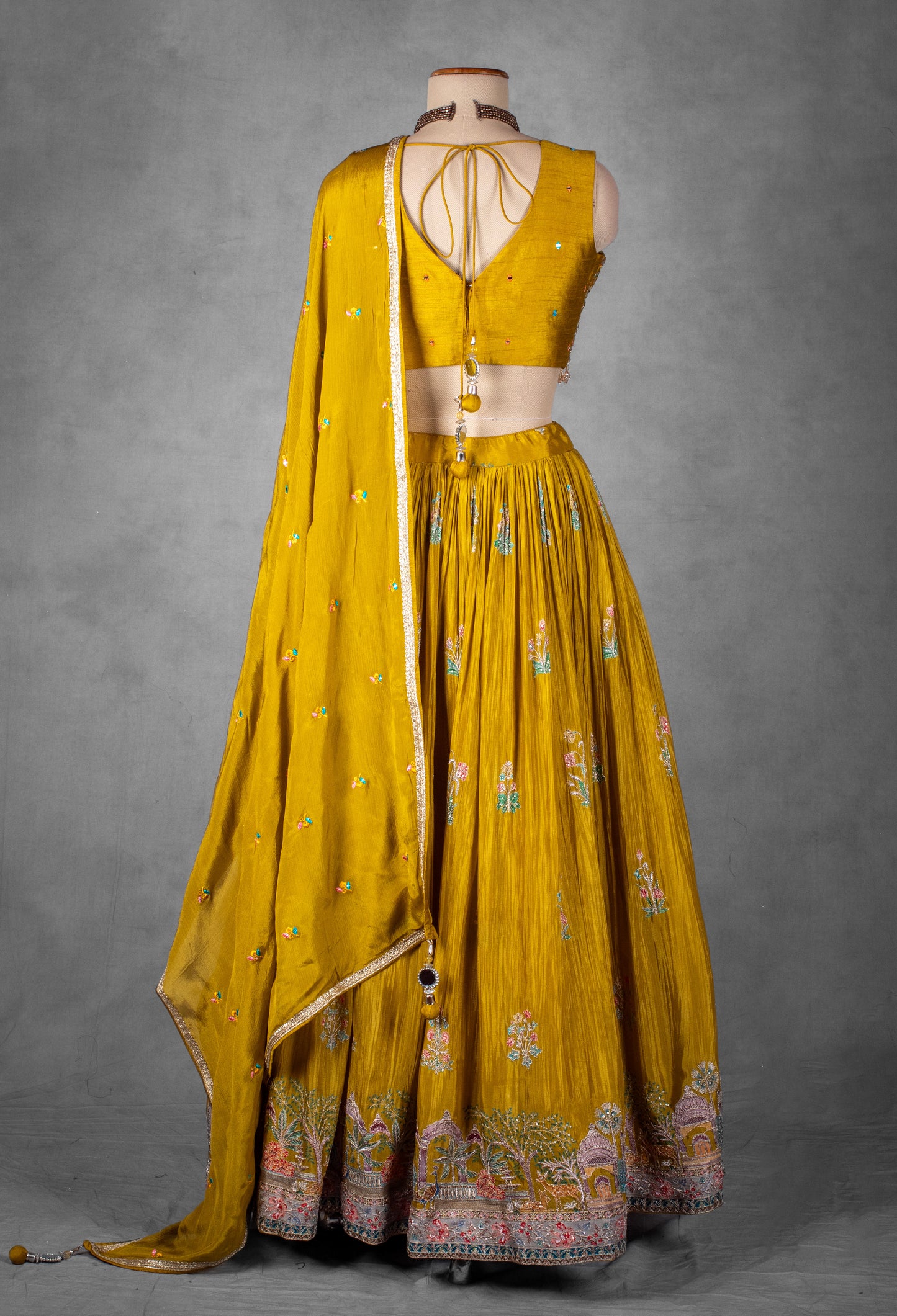 Mustard Yellow Hand-Embroidered Lehenga Set with Multicolor Thread and Zari Work