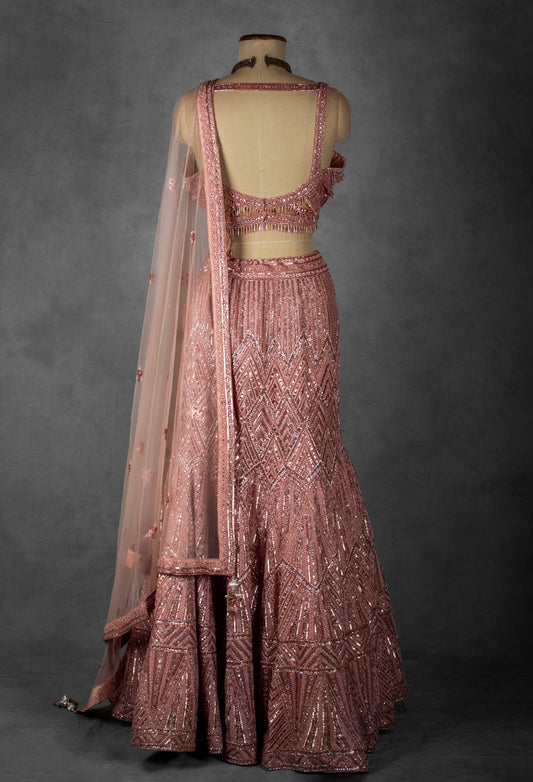 Blush pink sequin embroidered lehenga with cutout blouse and net dupatta – product image 2