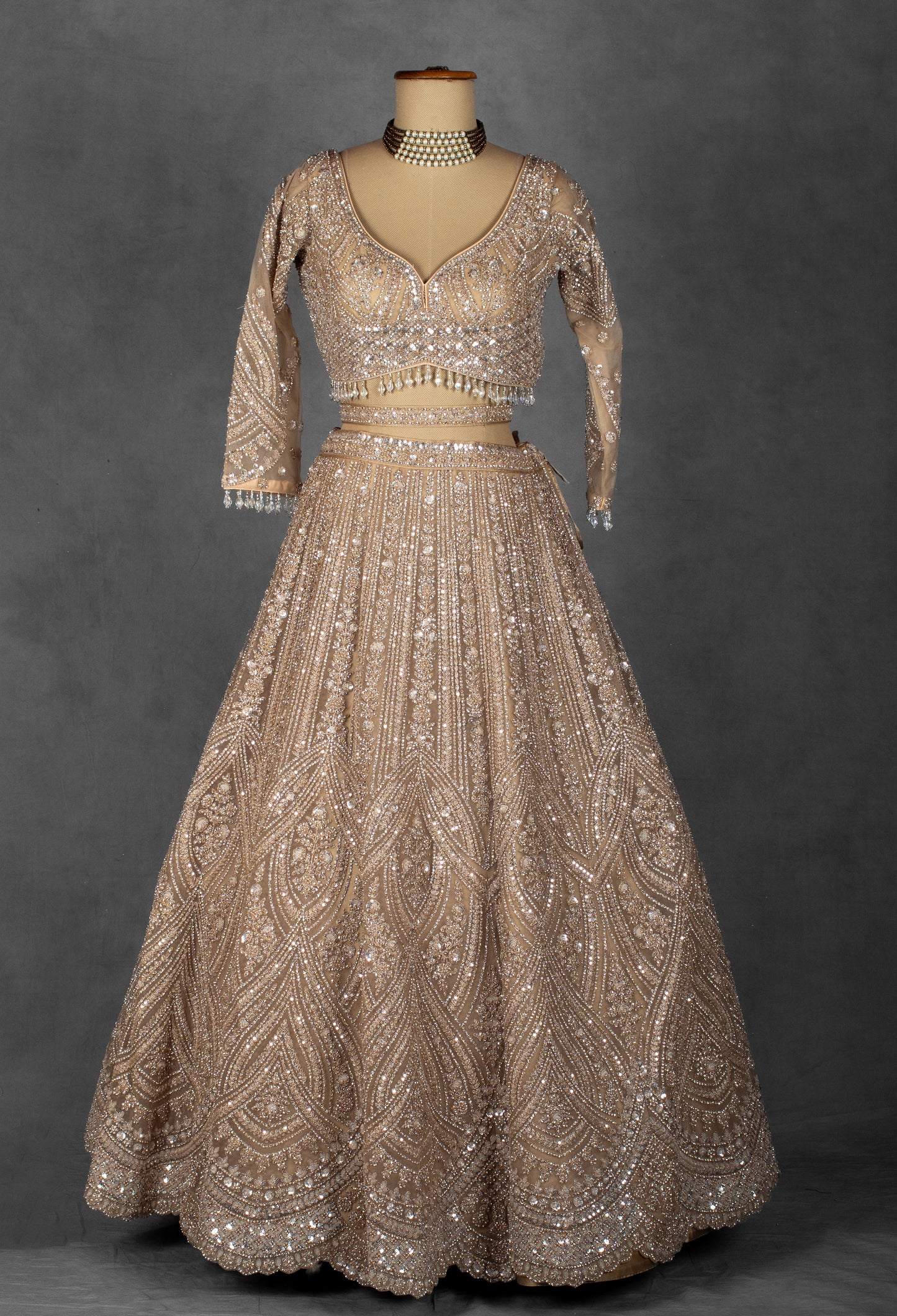 Champagne Gold Sequin Embroidered Lehenga with Full-Sleeve Blouse and Net Dupatta