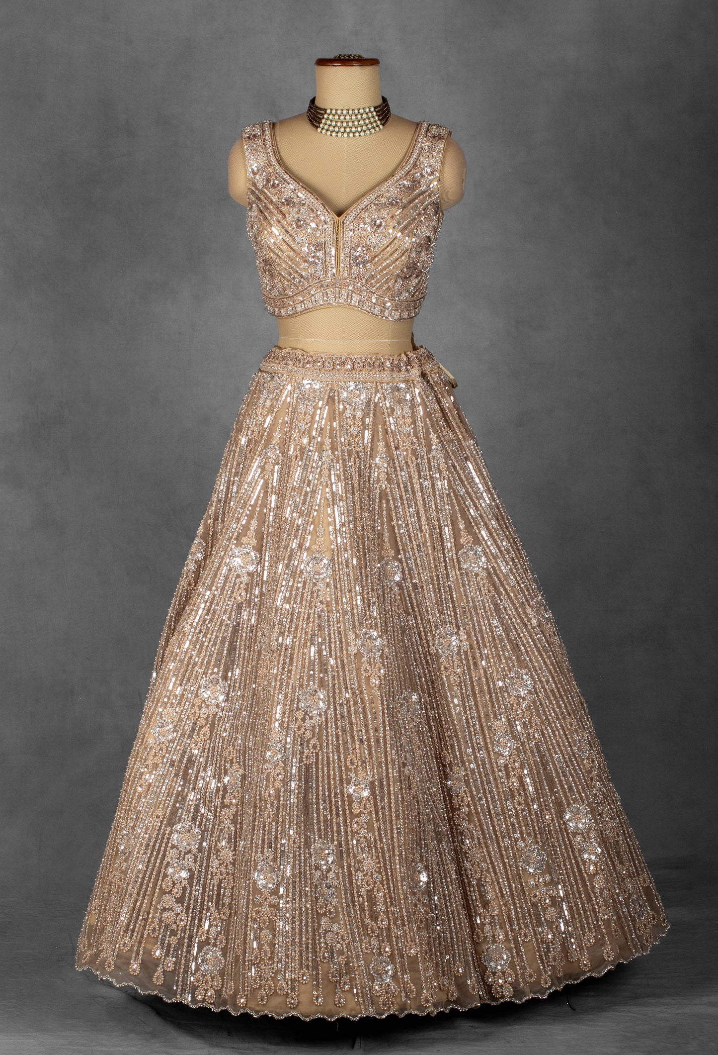 Champagne Gold Sequin Embroidered Lehenga with Structured Blouse and Net Dupatta