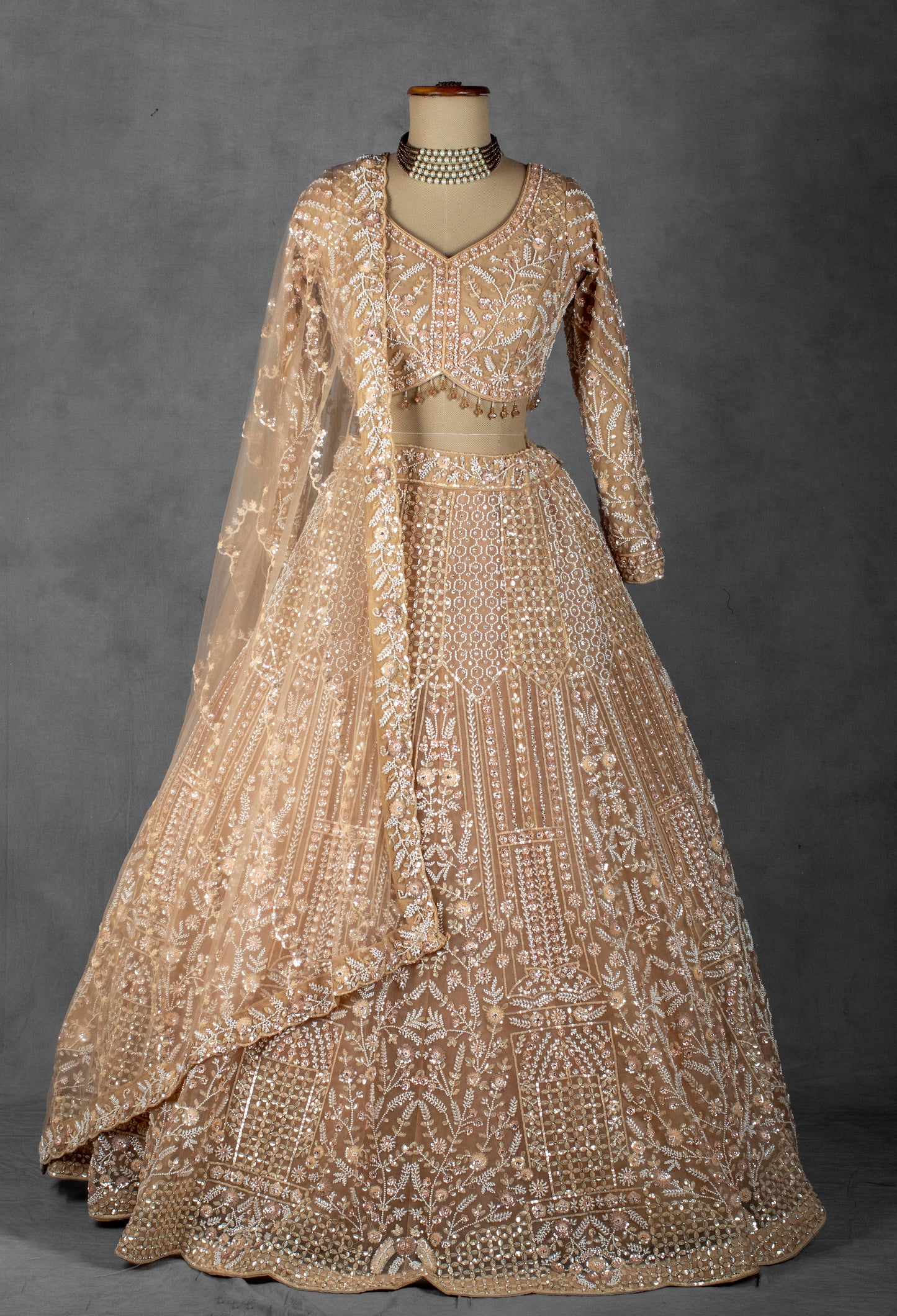 Golden Beige Hand-Embroidered Sequin and Pearl Lehenga with Full-Sleeve Blouse and Net Dupatta