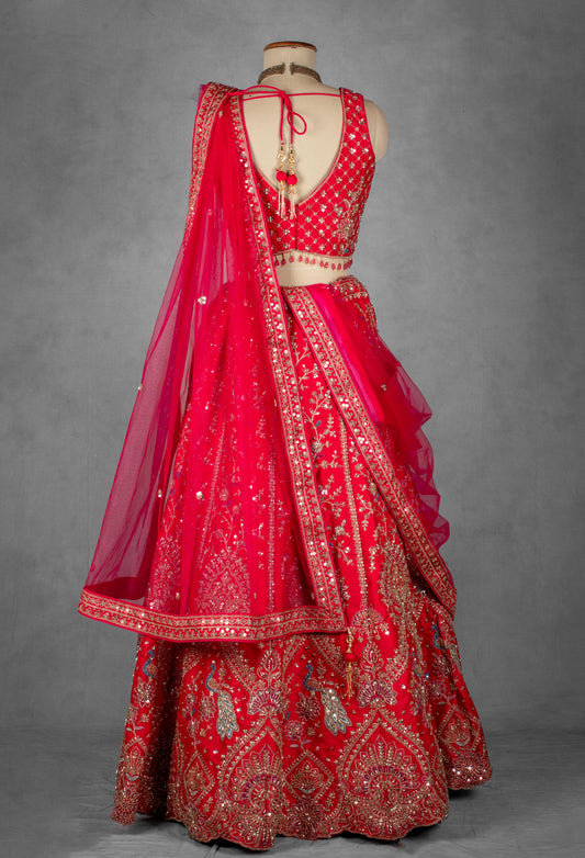 Red embroidered bridal lehenga with golden zardosi and threadwork – product image 2