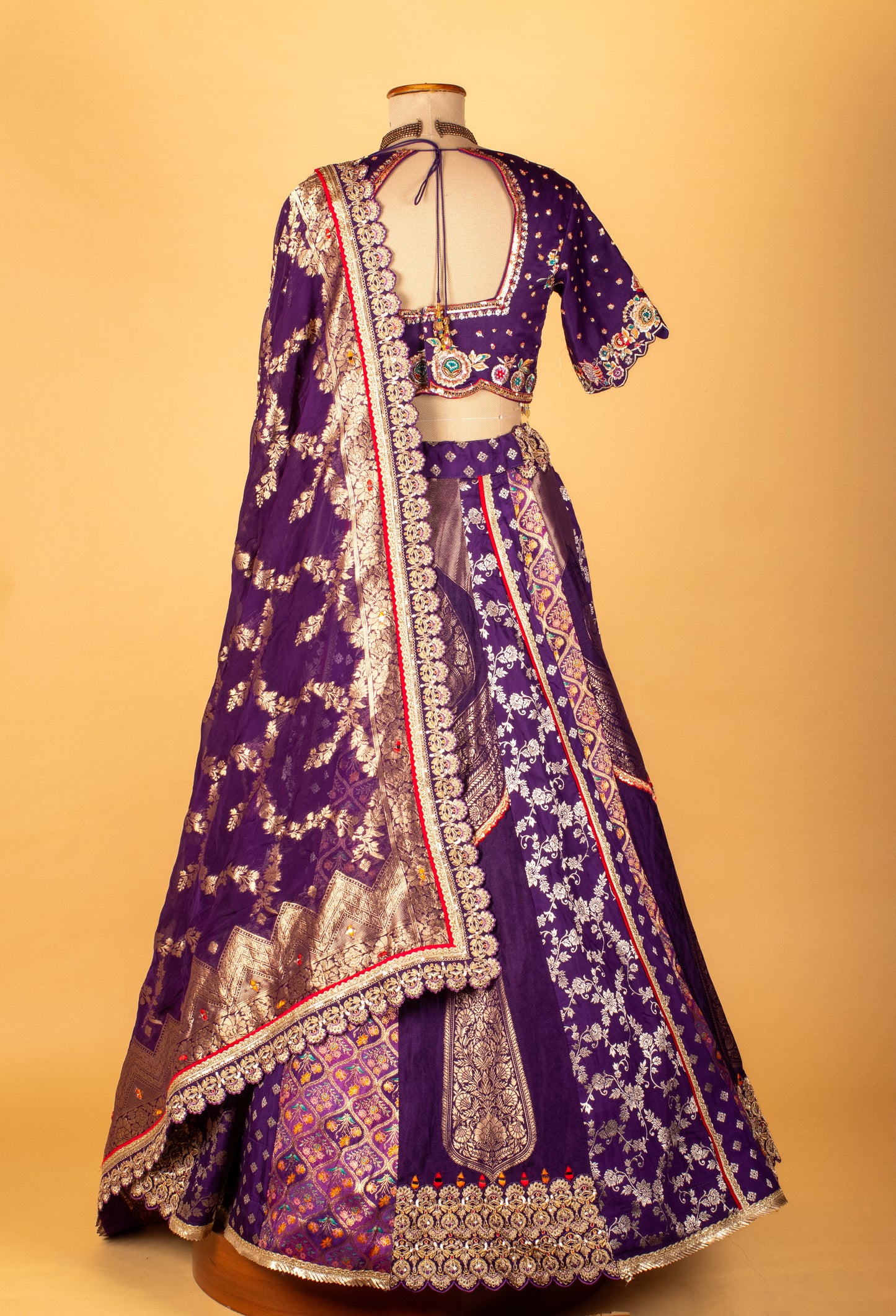Royal Purple Banarasi Zari Croptop Lehenga with Multicolor Hand Embroidery