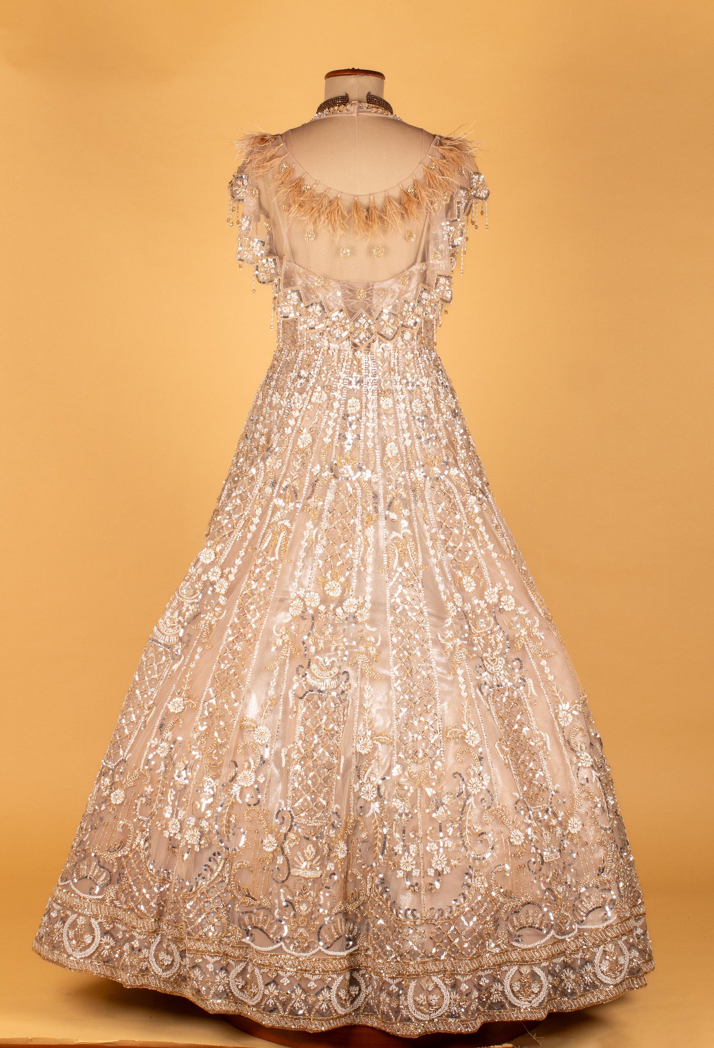 Champagne Gold Fully Hand-Embroidered Bridal Gown with Feathered Shoulders & Cut-Out Bodice