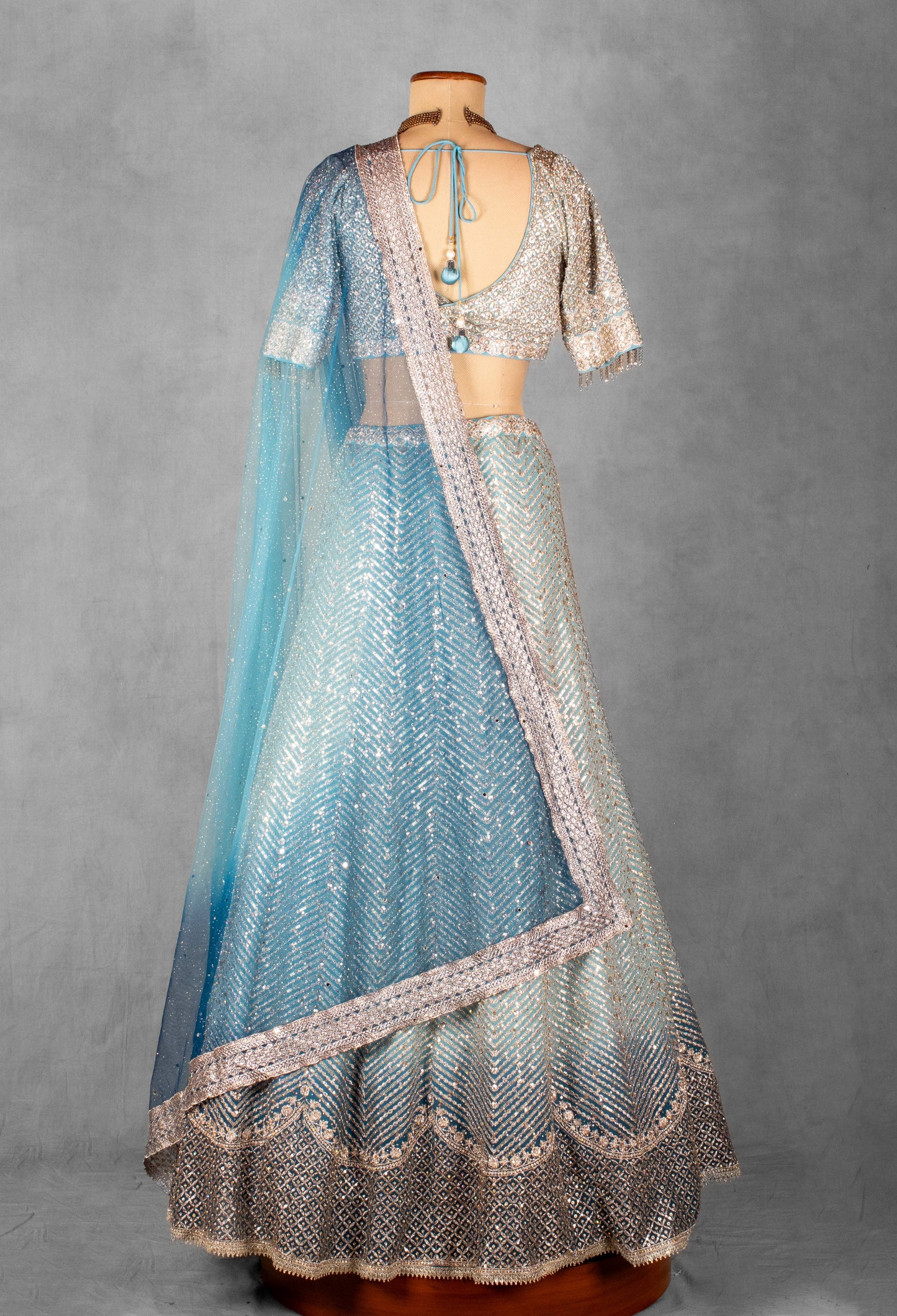 Ice Blue Sequin & Thread Embroidered Lehenga Set with Designer Blouse and Net Dupatta