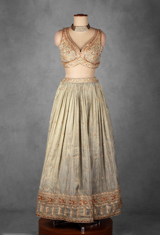 Sage green embroidered lehenga with designer crop top and orange dupatta – product image 2