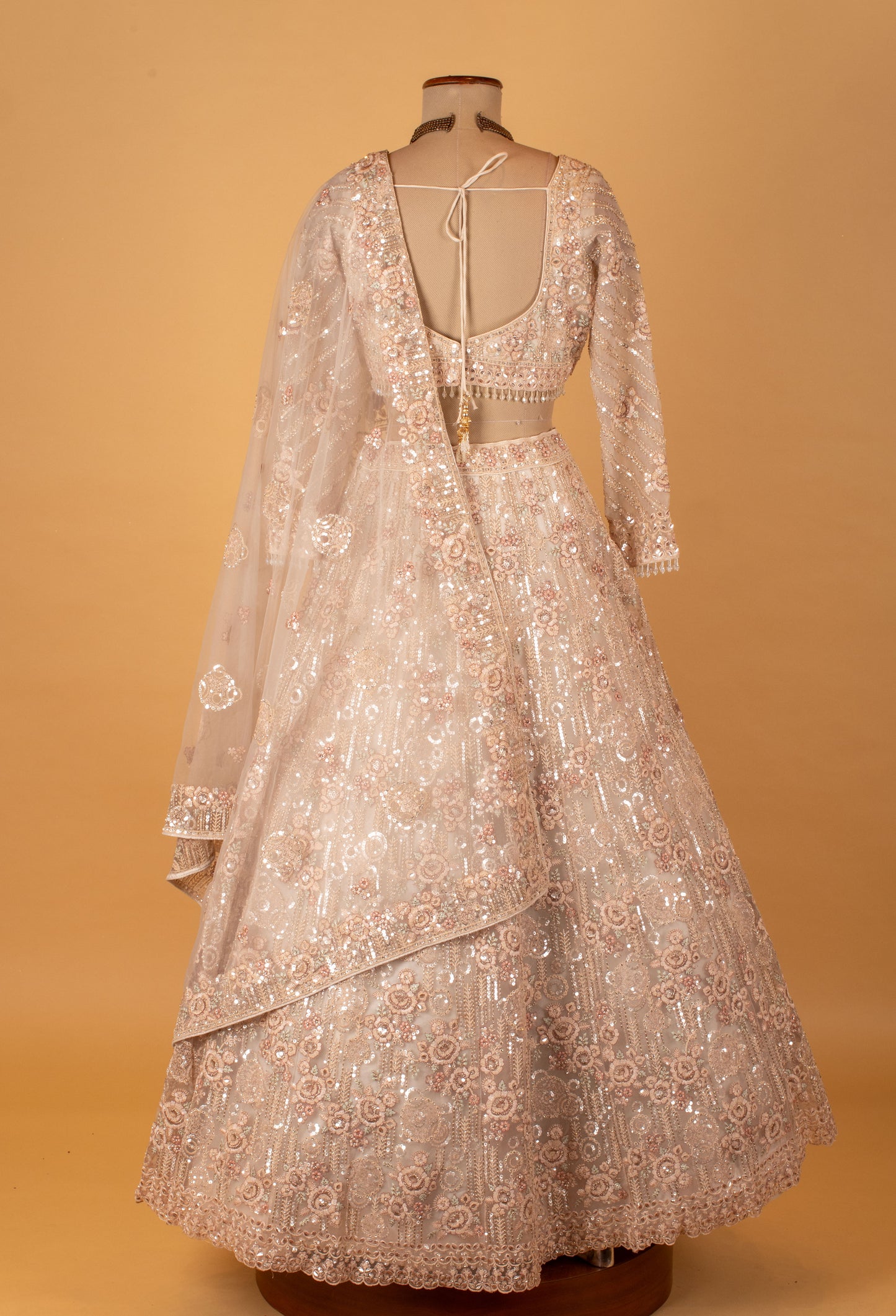 Champagne Ivory Embellished Crop Top Lehenga Set with Net Dupatta