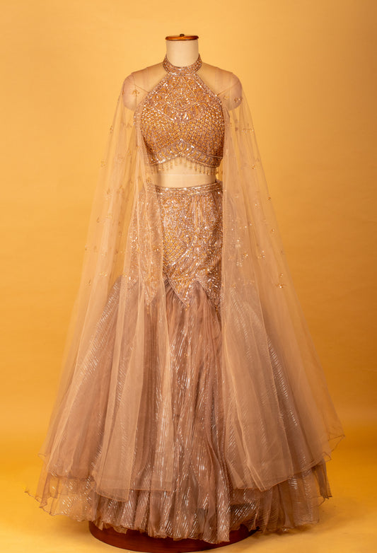 Champagne gold embellished lehenga with halter crop top and sheer cape – product image 2