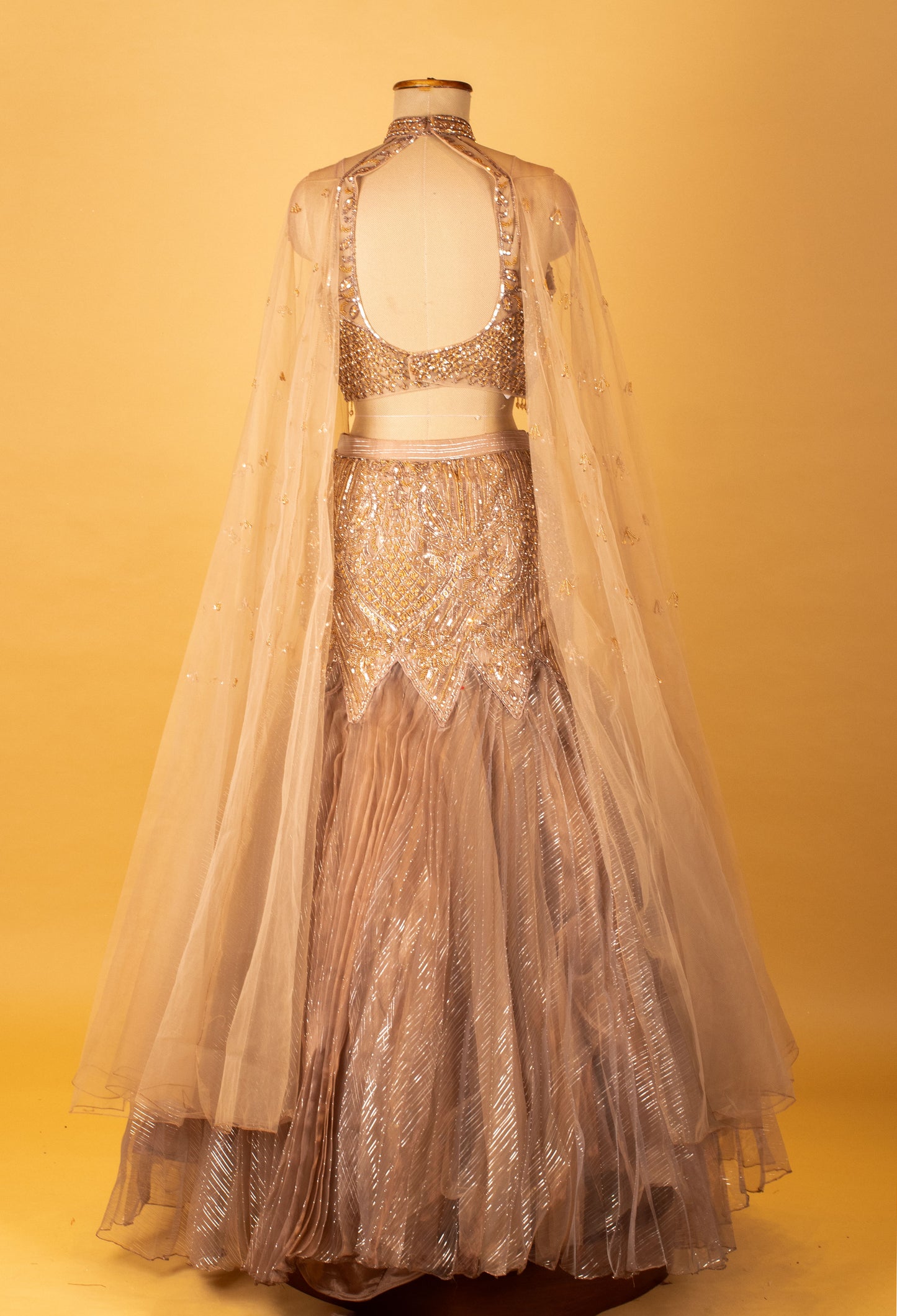 Champagne Gold Embellished Crop Top Lehenga Set with Sheer Cape
