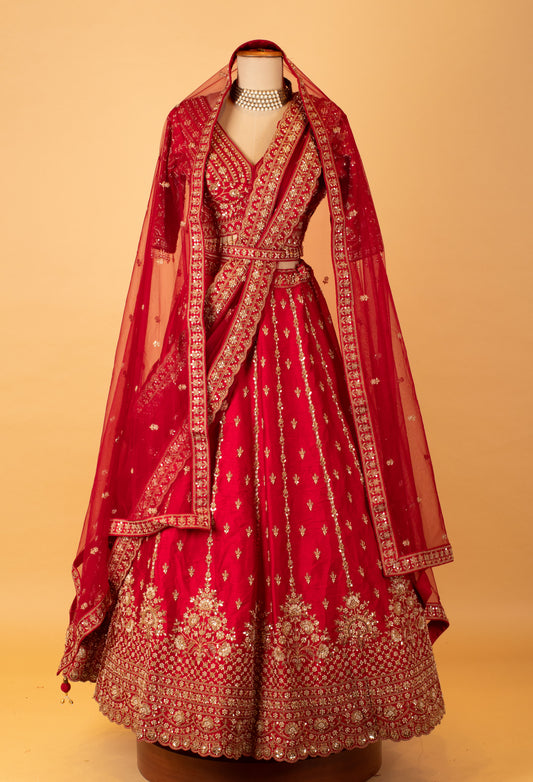Deep red embroidered bridal lehenga with crop top and net dupatta – product image 2
