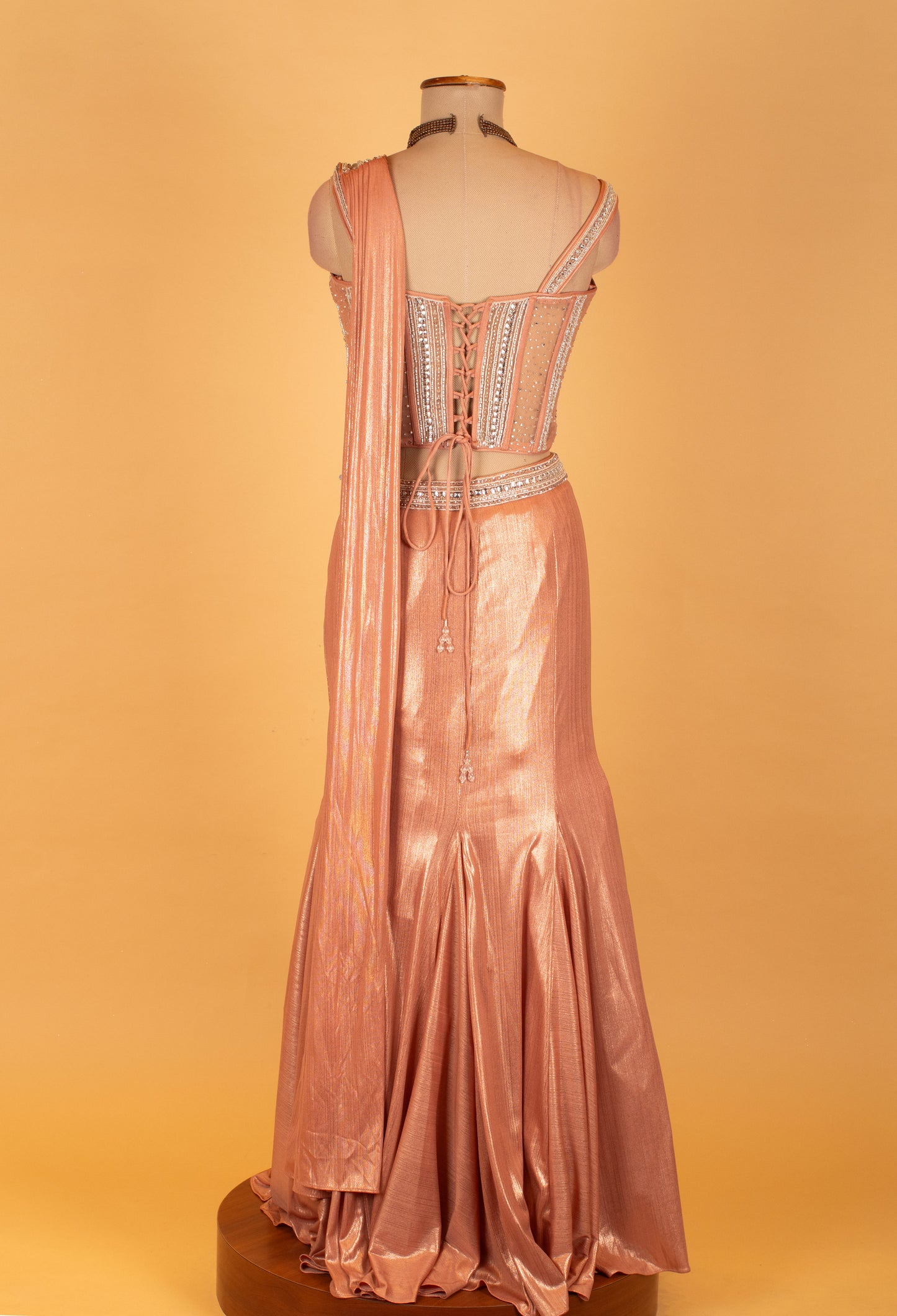 Rose Gold Metallic Mermaid Gown with Embellished Bustier & Attached Drape – Luxury Reception & Evening Wear