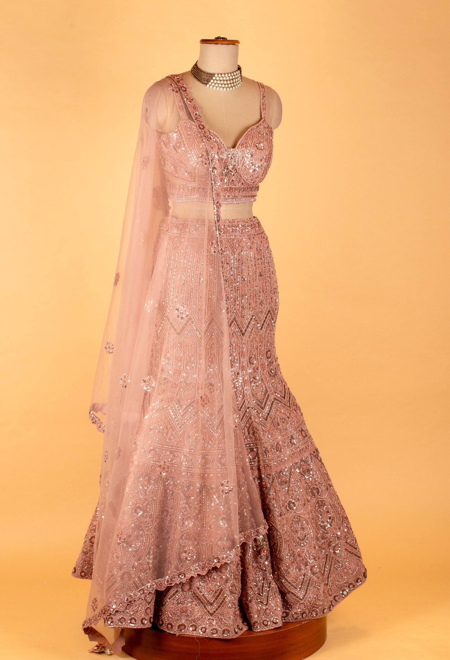 Rose Gold Embroidered Lehenga Choli with Net Dupatta