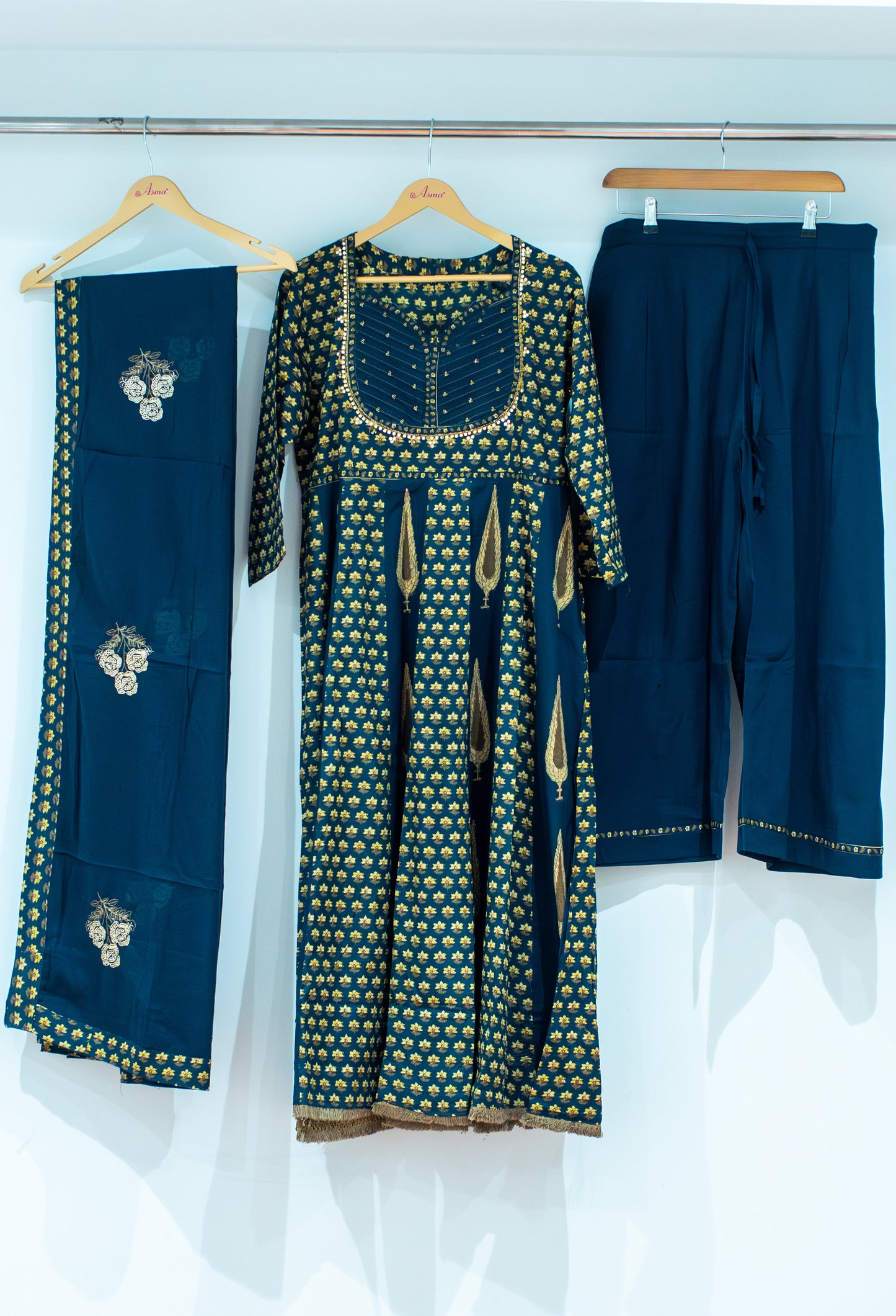 "Set Includes: Kurta, Pants & Dupatta Color: Olive Green Fabric: