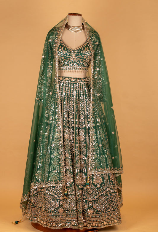 Emerald Green Heavy Embroidered Crop Top Lehenga Set with Net Dupatta - view 2