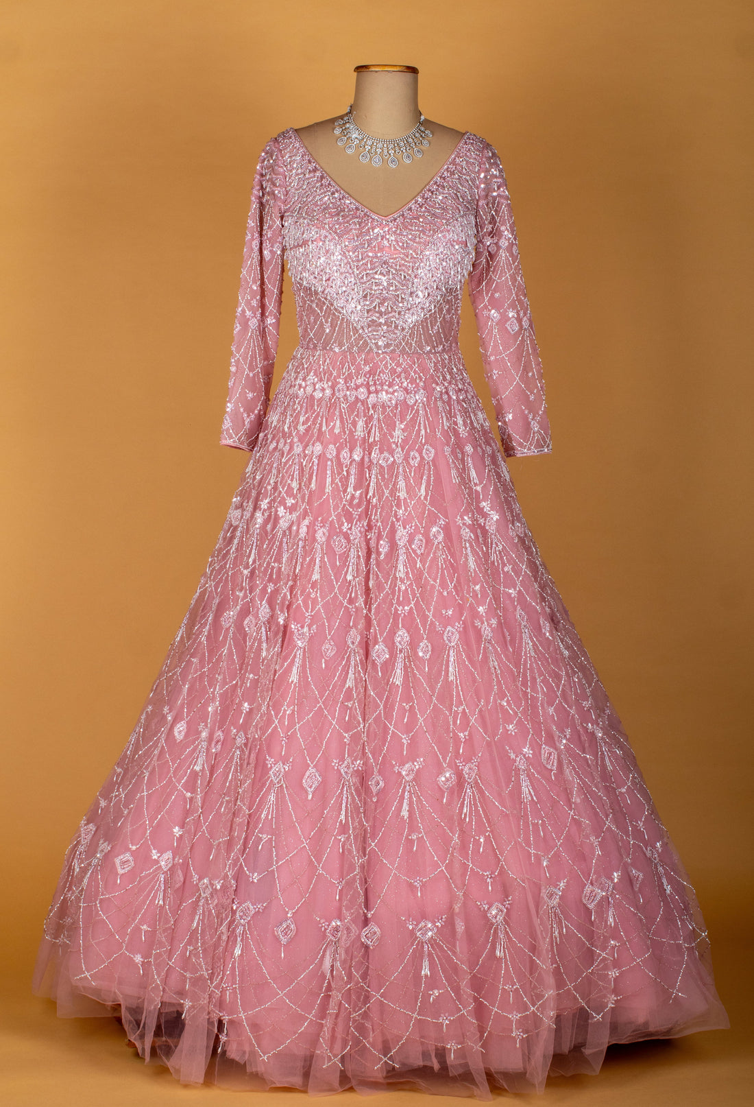 Blush pink ASMA gown with full sleeves and embellished detailing