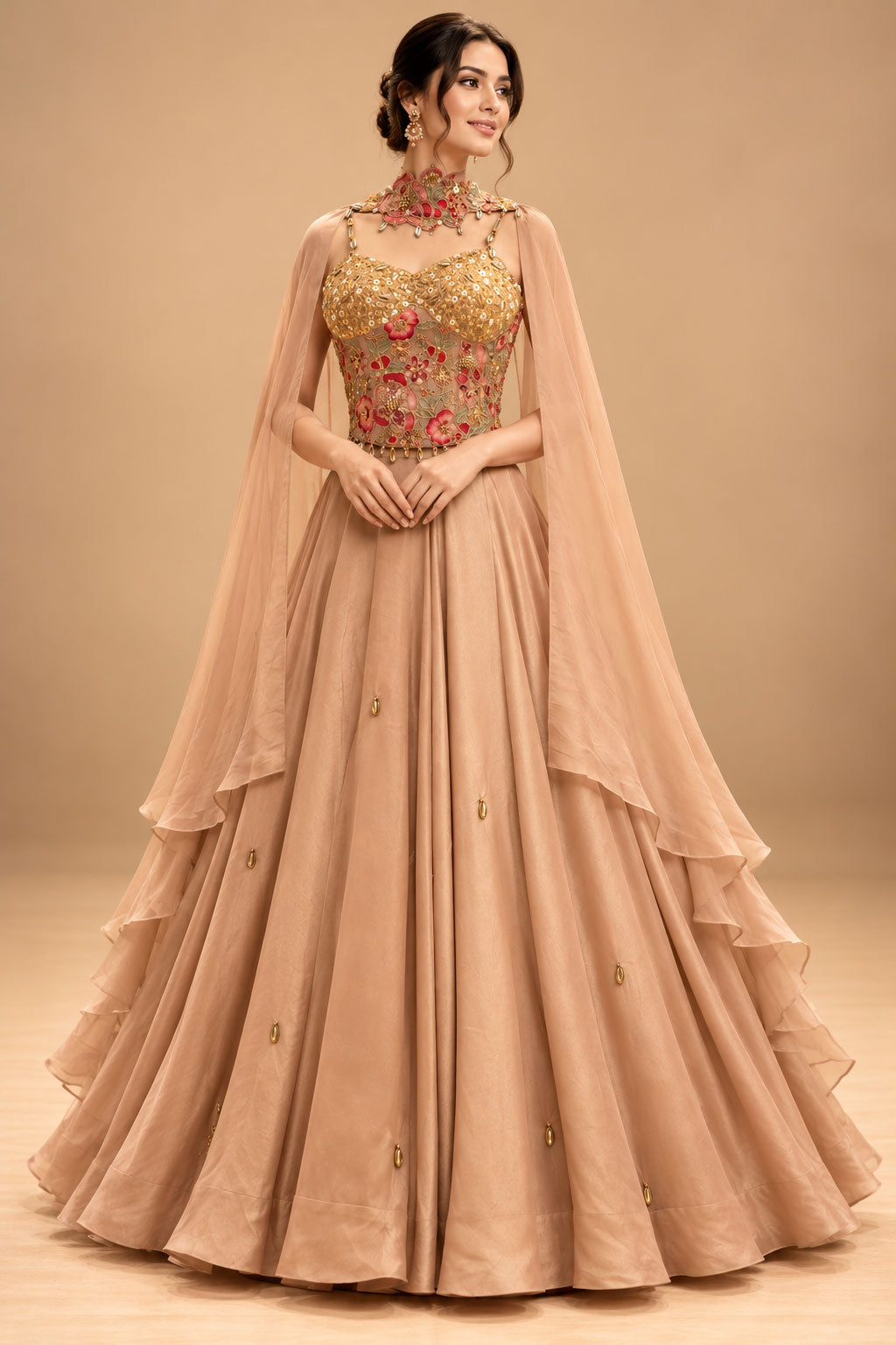 Premium Blush Peach Designer Gown with Gold Floral Embroidery and Sheer Cape – product image 1