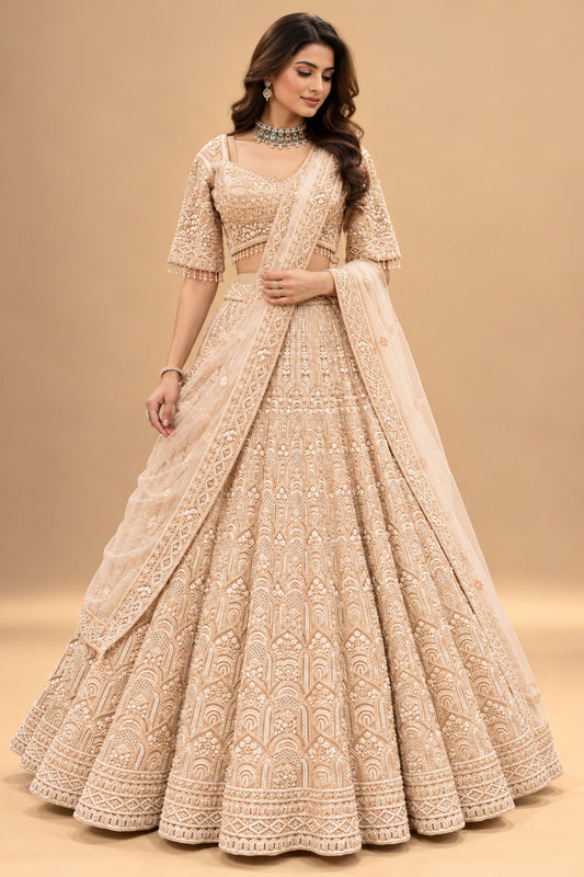 Luxury Champagne Beige Bridal Lehenga with Intricate Thread Embroidery and Heavy Embellished Dupatta