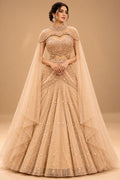 Premium Champagne Gold Embroidered Lehenga with Sheer Cape Sleeves for Women – product image 1