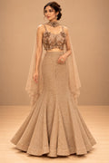 Premium Champagne Gold Sequin Embellished Mermaid Lehenga with 3D Floral Blouse and Sheer Cape – product image 1