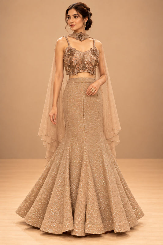 Premium Champagne Gold Sequin Embellished Mermaid Lehenga with 3D Floral Blouse and Sheer Cape – product image 1
