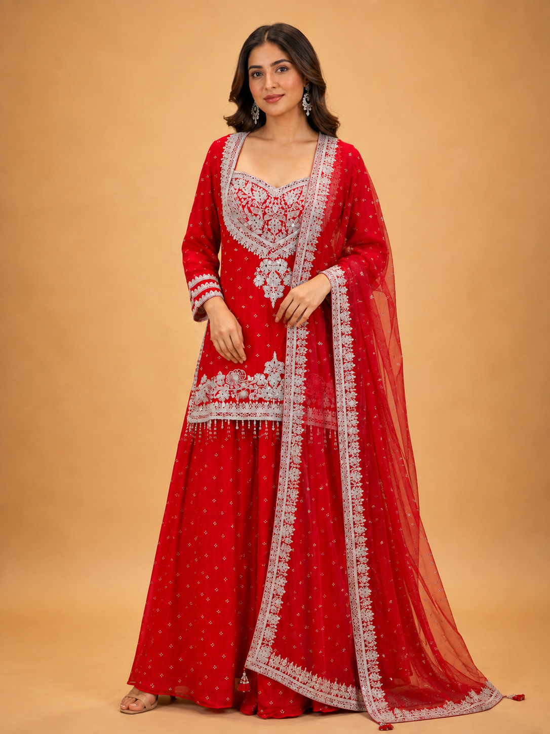 Red embroidered sharara set for women with white detailing and sheer dupatta