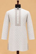 Premium Pastel Sky Blue Men's Kurta Pyjama Set with Intricate Geometric Pattern and Embroidered Neckline