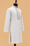 Premium Pastel Sky Blue Men's Kurta Pyjama Set with Intricate Geometric Pattern and Embroidered Neckline