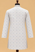 Premium Pastel Sky Blue Men's Kurta Pyjama Set with Intricate Geometric Pattern and Embroidered Neckline
