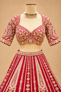 Premium Rani Pink Bridal Lehenga with Heavy Zari Embroidery, Traditional Motifs and Embellished Net Dupatta