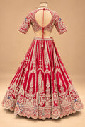 Premium Rani Pink Bridal Lehenga with Heavy Zari Embroidery, Traditional Motifs and Embellished Net Dupatta