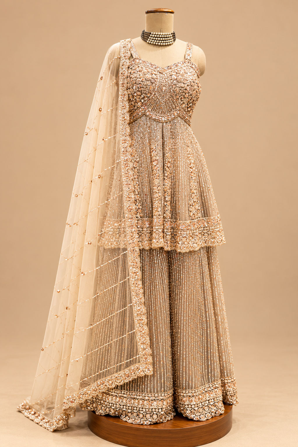 Premium Champagne Gold Embroidered Designer Sharara Set with Peplum Top and Net Dupatta