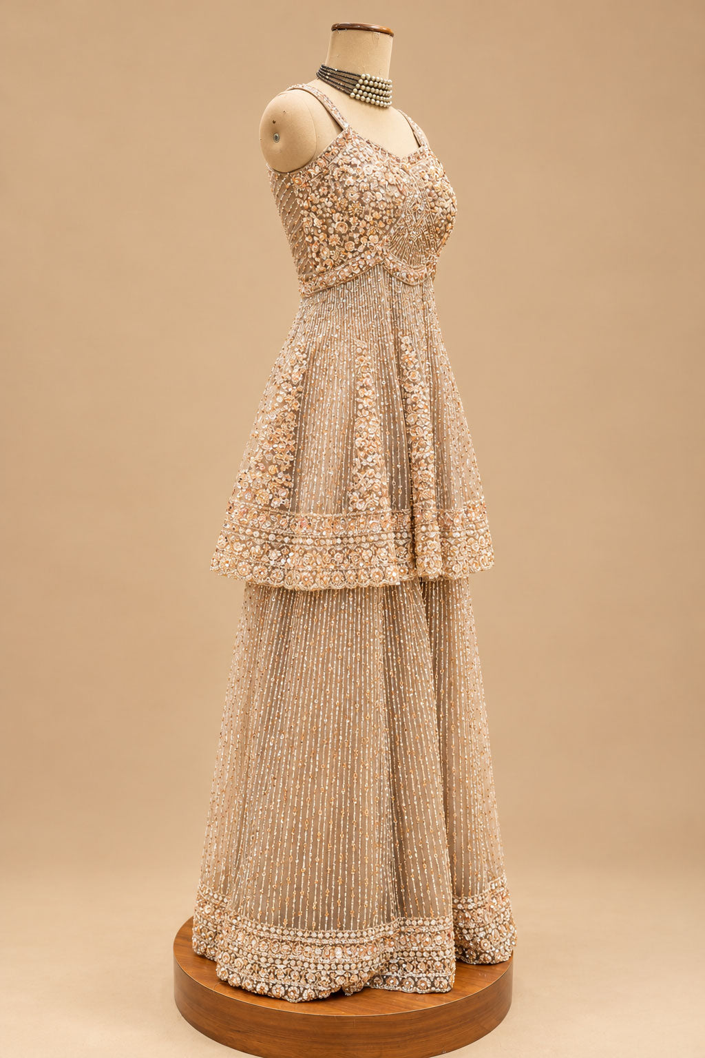 Premium Champagne Gold Embroidered Designer Sharara Set with Peplum Top and Net Dupatta